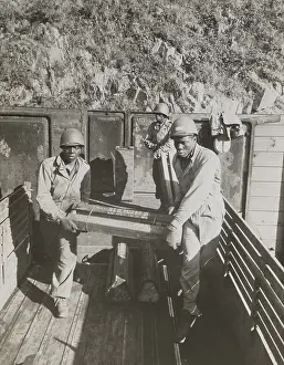 Handlers: African American ammunition handlers unloading