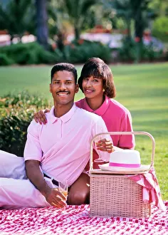 Laf002: African-American Couple Sitting Looking at Camera on