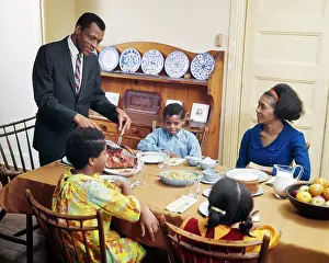 Parenthood: African American Family at the Dinner Table