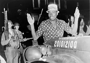 Hough: African American man with arms raised in ?