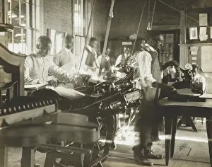 Young Men: African American men working at printing presses