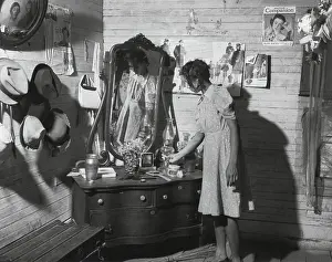 Aspirations: African American women at her dressing table in
