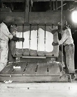 Baling: Two African American Workers Removing 500 Pound