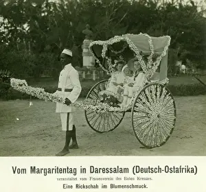 Salaam: An African man pulls a rickshaw with three white children