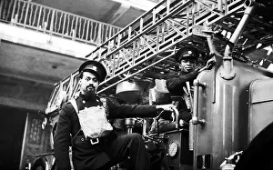 Firefighers: Two AFS firefighters with turntable ladder, WW2