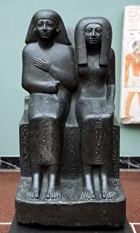 1490: Ahmose and his mother. Egyptian statue