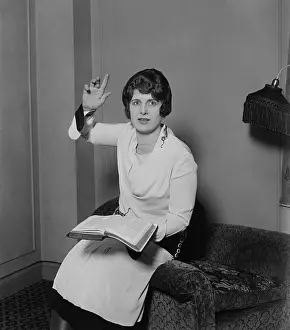 One Person: Aimee Semple McPherson, in a preaching pose, Feb