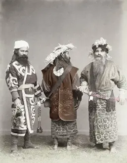 Ainu: Ainu men with swords in a studio setting, Japan