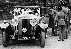 Levee: Air Force officers next to Rolls Royce, 1930