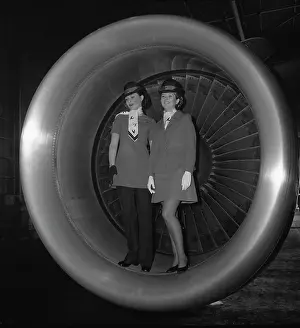 Laker: Two air hostesses posing in a DC-10 engine