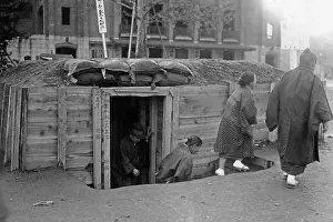 Stretcher: Air raid drill in Japan, 1941