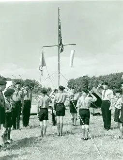 Salutes: Air Scouts saluting flags