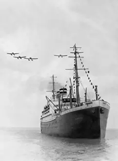 Originates: Aircraft over a steamer, 1930