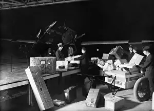 Packages: Airmail pilot before take-off, 1928