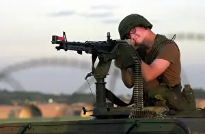M 60: An airman mans a M-60 machine gun at a defensive