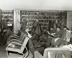 Erding: Airmen Reading Books and Magazines in the Library of the?
