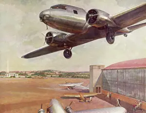 Airliners: Airplane flies Low over Airport