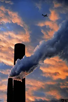 Ignoring: Airplane Flying Over Smokestack Emitting Water