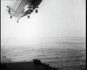 Attempting: Airship Approaching An Aircraft Carrier And