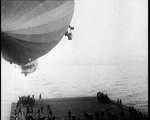 Attempting: Airship Approaching An Aircraft Carrier And
