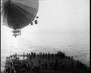 Attempting: Airship Approaching An Aircraft Carrier And