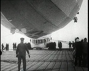 Attempting: Airship Approaching An Aircraft Carrier And
