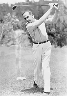 Smokes: Al Jolson playing golf, 1930