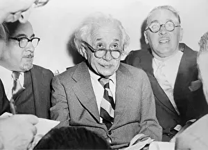Laureates: Albert Einstein celebrates his 74th birthday