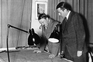 Germania: Albert Speer and Adolf Hitler examine blueprints, 1937