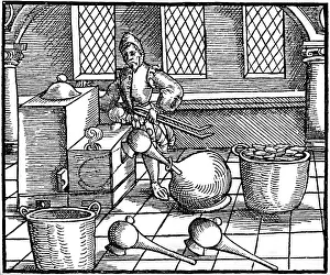 Destillation: alchemy, distillation of nitric acid, woodcut
