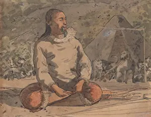 Alaskan: An Aleutian man sits in front of a tent and