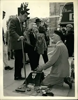 Exchanging: Alex Samuels, American playwright, has a shoe shine, London