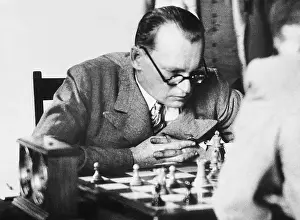 Alekhine: Alexander Alekhine playing chess, 1936