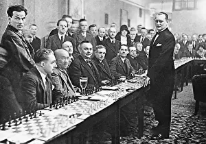 Remo: Alexander Alekhine playing simultaneous chess, 1930
