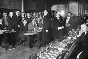 Simultaneous: Alexander Alekhine playing simultaneous chess, 1926
