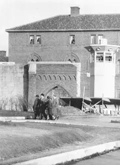Scares: Alger Hiss escorted from federal prison by his