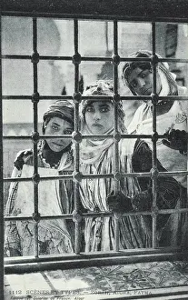 Longing: Three Algerian Girls looking in through the window