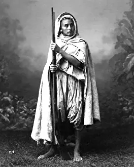 Algerian man with gun