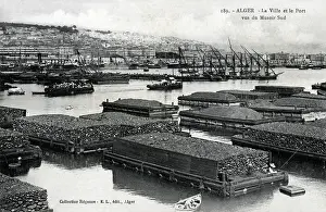 Quarried: Algiers, Algeria - Stone on floating barges in the harbour