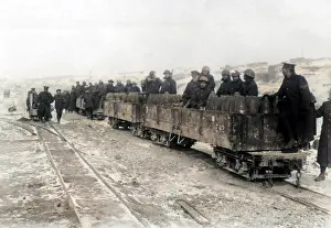 Frosty: Allied soldiers on small ammunition train, WW1