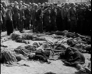Belsen: Allied Soldiers Standing in a Ring Around A