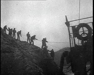 Shipwrecked: Allied Soldiers Using Ropes to Help American