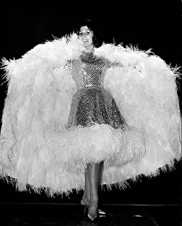 Feathery: Alma Cogan, singer, in feathery costume