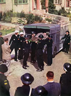 Home Front: An Ambulance with Wardens helping in an emergency