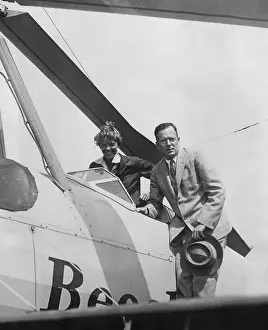 Putnam: Amelia Earhart greeted by her husband George ?