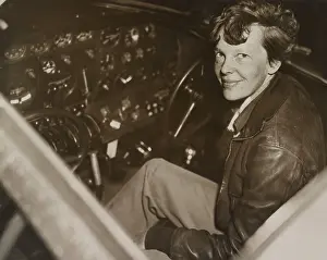 Dashboard: Amelia Earhart sitting in the cockpit of her Lockheed