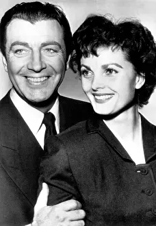 Thiess: American actor Robert Taylor (left), with ?