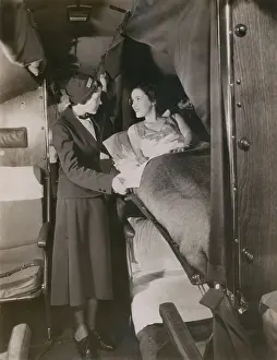 Stewardesses: American Airlines stewardess with a passenger ?