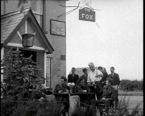 Landlord: American Airmen Drinking Outside A Public House