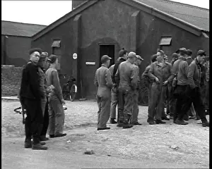 Queueing: American Airmen Queueing Up Outside A Building